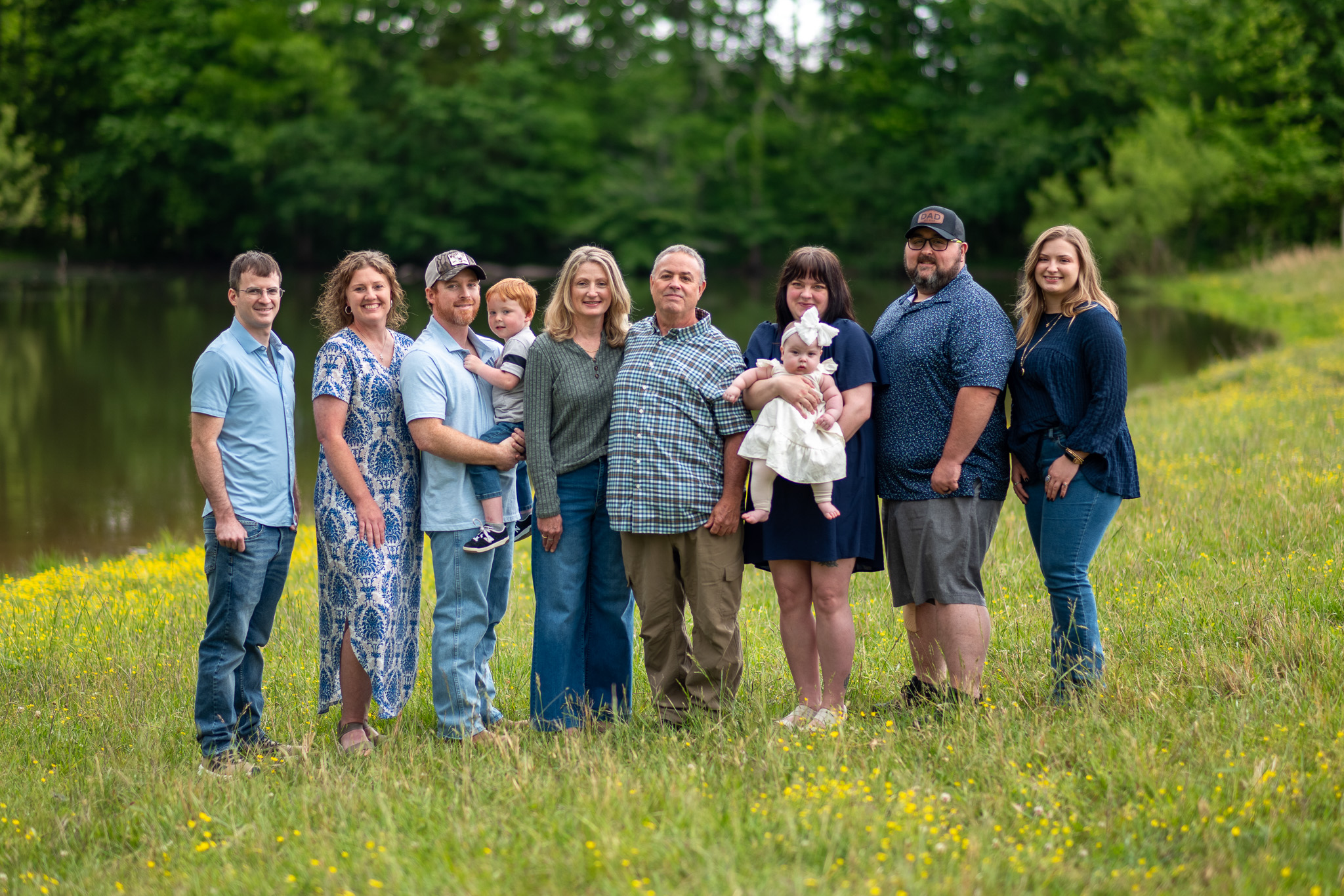 A family portrait of an extended family of ten people including the client's children and grandchildren.