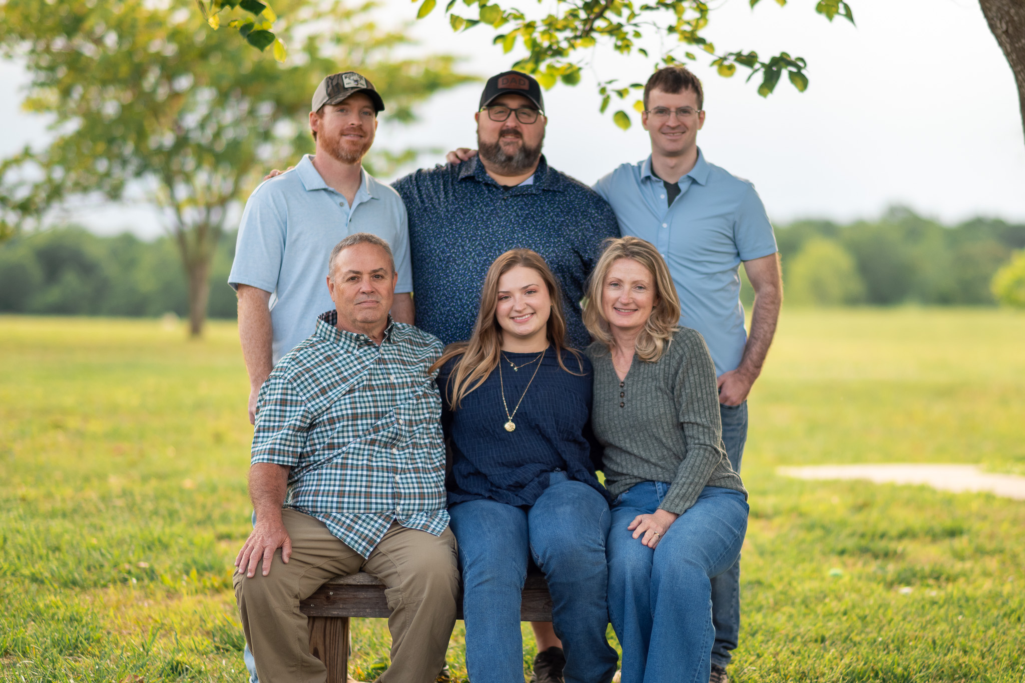 A family portrait of a couple and their four adult children.